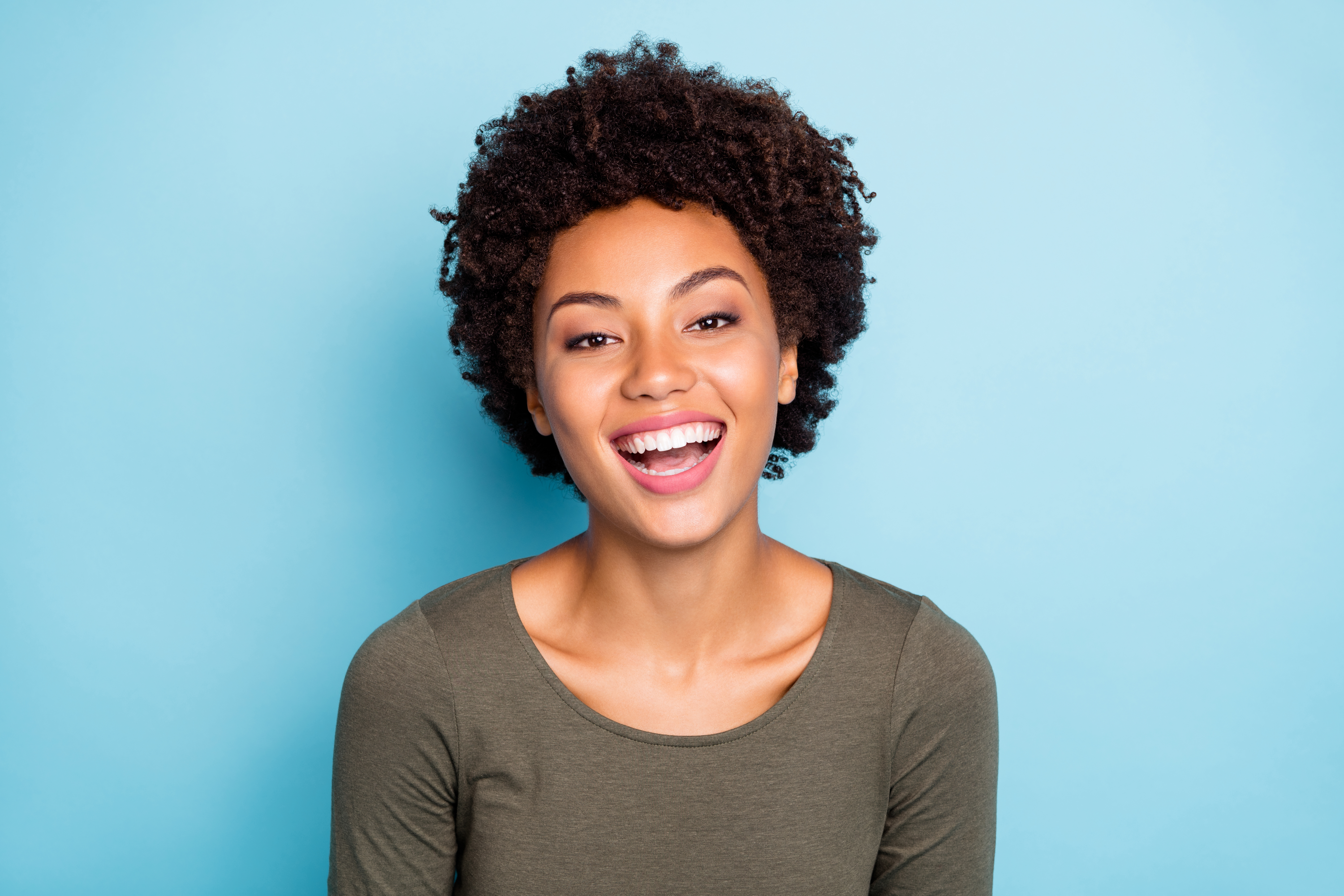 A woman smiling.